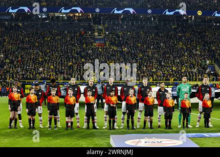 DORTMUND - PSV players during the UEFA Champions League round of 16 match between Borussia Dortmund and PSV Eindhoven at Signal Iduna Park on March 13, 2024 in Dortmund, Germany. ANP MAURICE VAN STEEN Stock Photo