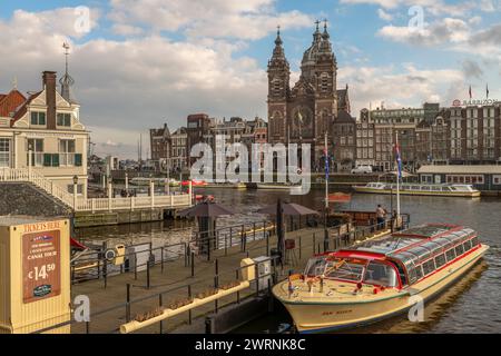Center of capital in spring sunny fresh day in Amsterdam Netherlands 03 06 2024 Stock Photo