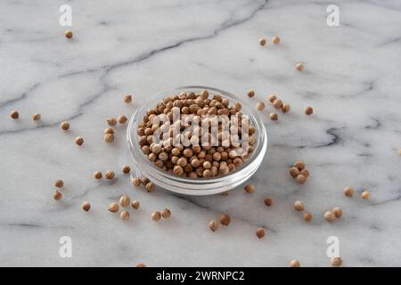 Close-up of dried coriander seeds Stock Photo