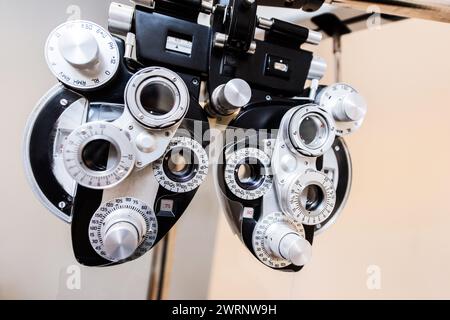 Opthalmic phoropter visual testing device used during eye exams Stock Photo