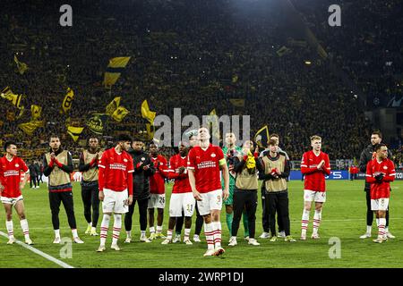DORTMUND - PSV players thank the crowd during the UEFA Champions League round of 16 match between Borussia Dortmund and PSV Eindhoven at Signal Iduna Park on March 13, 2024 in Dortmund, Germany. ANP MAURICE VAN STEEN Stock Photo