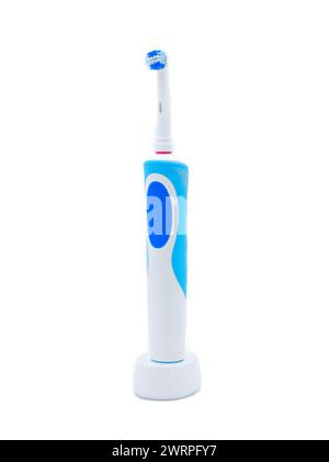 Electric toothbrush standing upright isolated on a white background Stock Photo