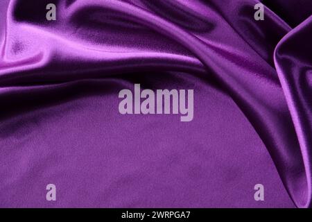 Close-up of ripples in purple silk fabric Stock Photo