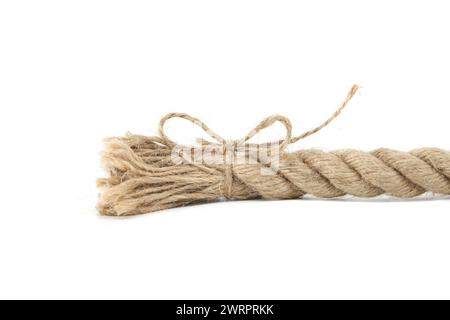 A close-up image of a coiled rope on a white background, with the ends of the rope tied Stock Photo