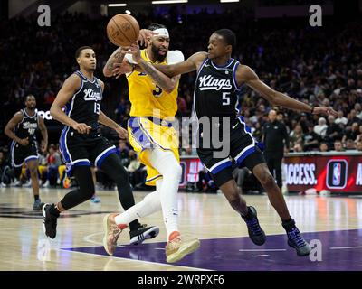 Sacramento, Ca, USA. 13th Mar, 2024. Sacramento Kings guard De'Aaron Fox (5) battles for the ball with Los Angeles Lakers forward Anthony Davis (3) during a game at Golden 1 Center on Wednesday, March 13, 2024 in Sacramento. (Credit Image: © Paul Kitagaki Jr./ZUMA Press Wire) EDITORIAL USAGE ONLY! Not for Commercial USAGE! Stock Photo