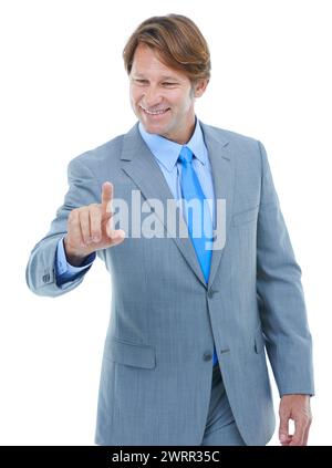 Happy businessman, pointing and touch with interface or interaction on a white studio background. Mature man or male person with finger on selection Stock Photo