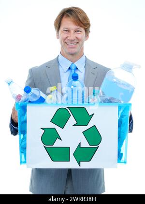 Happy businessman, portrait and box with recycle plastic for eco friendly environment on a white studio background. Man or employee with bucket of Stock Photo
