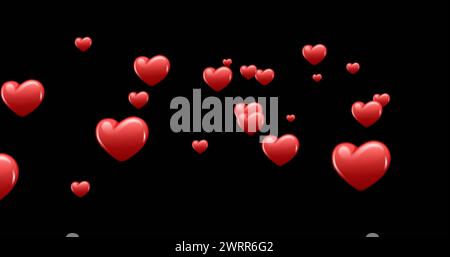 Digital image of red heart icons moving upwards in the black background 4k Stock Photo