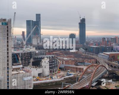 Aerial photo of Novella apartments, Aviva Studios & Crown Street apartment tower under construction in Manchester city centre, UK with Ordsall Chord Stock Photo