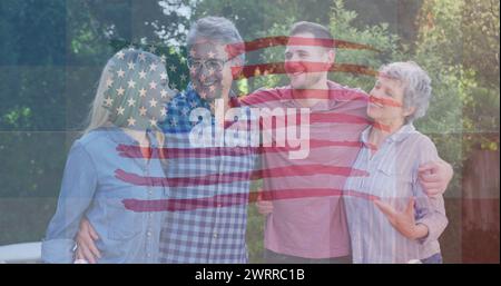 Image of flag of united states of america waving over smiling caucasian family Stock Photo