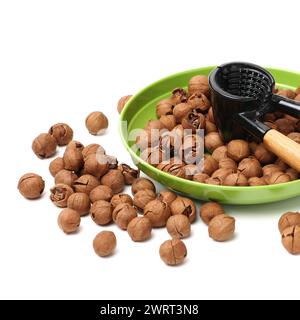 shagbark hickory nuts on white background Stock Photo