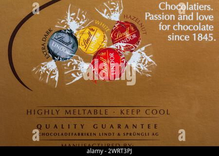 highly meltable keep cool - detail on box of Lindt Lindor Assorted irresistibly smooth assorted truffles with a smooth melting filling Stock Photo