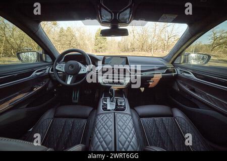 Inside moden car background, luxury car interior elements wallpaper. Black leather car interior Stock Photo