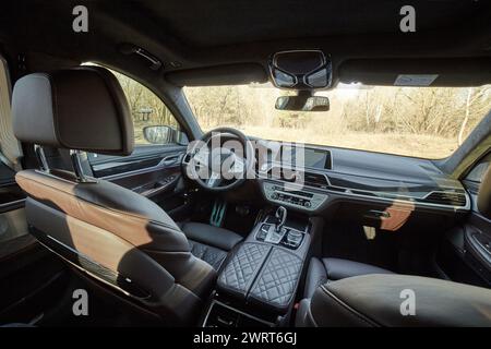 Inside moden car background, luxury car interior elements wallpaper. Black leather car interior Stock Photo