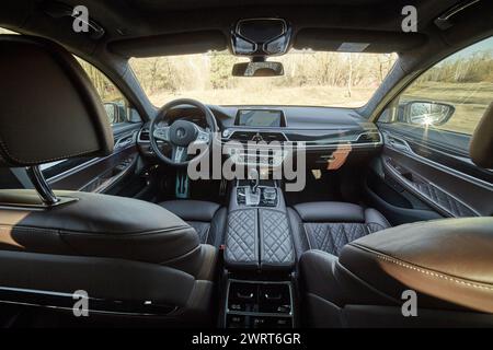 Inside moden car background, luxury car interior elements wallpaper. Black leather car interior Stock Photo