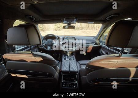 Inside moden car background, luxury car interior elements wallpaper. Black leather car interior Stock Photo