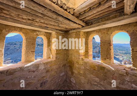 The interior of the tower in the ancient Dar al-Baraka, or House of Blessings, a fortified granary in the abandoned hilltop Berber village called Zrib Stock Photo