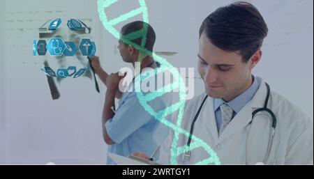 Image of DNA strand spinning and medical icons over male doctors wearing lab coats working in hospit Stock Photo