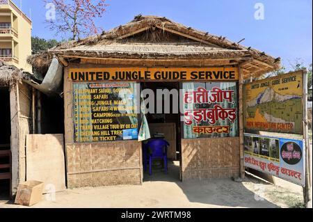 Front view of a tourist office for jungle safaris with various offers, Chitwan National Park, Bhairahawa, Nepal Stock Photo