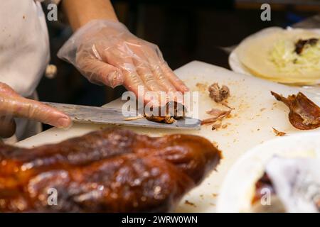 Crispy Peking duck cooked in the Chinese district of Nankinmachi in the city of Kobe in Japan. Stock Photo