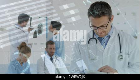 Image of statistics over medical staff Stock Photo