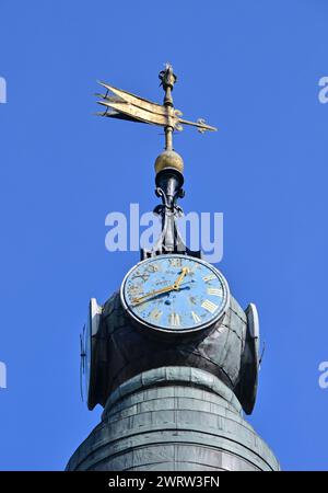 Clocks and weathervane on Church of St Anne, between Dean Street and Wardour Street, Soho, London, England, UK . Stock Photo