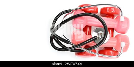 Set of dumbbells and stethoscope isolated on white background. Sports equipment. Health care concept. Free space for text. Wide photo . Stock Photo