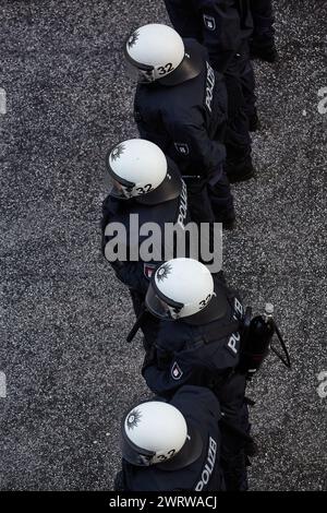 Policemen in riot gear on Waterville Road at the height of the ...