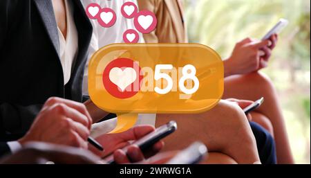 Digital image of a heart icon and increasing numbers inside a yellow chat box Stock Photo