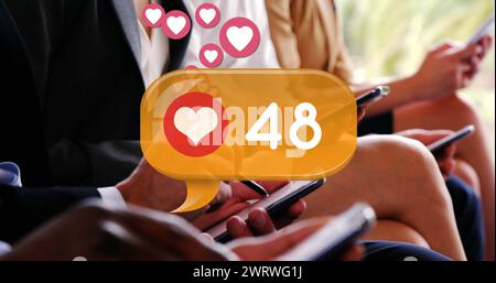 Digital image of a heart icon and increasing numbers inside a yellow chat box Stock Photo