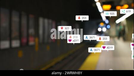 Image of social media icons and numbers over out of focus train platform Stock Photo