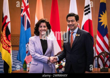 March 14, 2024, Bangkok, Bangkok, Thailand: March 14, 2024, Bangkok, Thailand, U.S. Secretary of Commerce, Gina Raimondo(L)''‹, shakes hand with Thai Foreign Minister Parnpree Bahiddha- Nukara (R)''‹ at Foreign Ministry in Bangkok, Thailand, Raimondo was in Thailand to promote US-Thai trade and investment relations, saying Thailand could benefit from efforts to diversify global supply chains. especially for semiconductors, and that Thailand's plans to emphasize a digital economy will benefit both nations. (Credit Image: © Wissarut Weerasopon/ZUMA Press Wire) EDITORIAL USAGE ONLY! Not for Comme Stock Photo