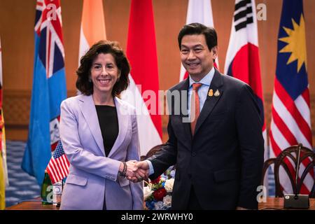 March 14, 2024, Bangkok, Bangkok, Thailand: March 14, 2024, Bangkok, Thailand, U.S. Secretary of Commerce, Gina Raimondo(L)''‹, shakes hand with Thai Foreign Minister Parnpree Bahiddha- Nukara (R)''‹ at Foreign Ministry in Bangkok, Thailand, Raimondo was in Thailand to promote US-Thai trade and investment relations, saying Thailand could benefit from efforts to diversify global supply chains. especially for semiconductors, and that Thailand's plans to emphasize a digital economy will benefit both nations. (Credit Image: © Wissarut Weerasopon/ZUMA Press Wire) EDITORIAL USAGE ONLY! Not for Comme Stock Photo