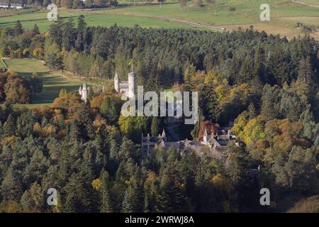 A View of Balmoral Castle in the Scottish Highlands from an Adjacent Hillside on an Autumn Morning, Showing the Castle Set in Woodland Stock Photo