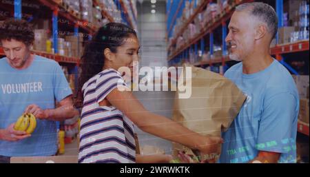 Image of data processing over diverse volunteers in warehouse Stock Photo