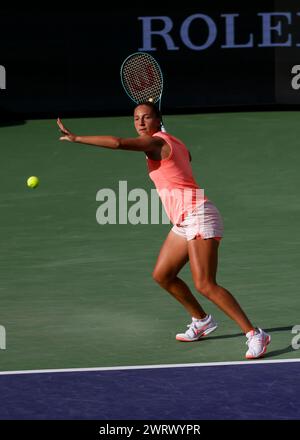 Maria Sakkari, of Greece, returns a shot to Petra Kvitova, of the Czech ...