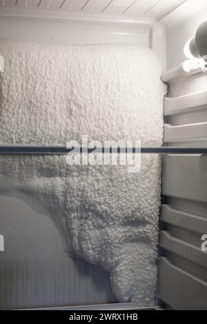 Frozen refrigerator that needs to be defrosted.  Stock Photo