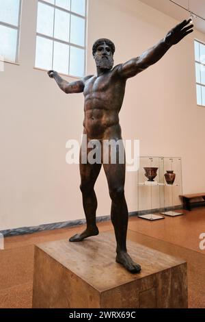 Athens, Greece - March 03, 2024: Bronze statue of Zeus or Poseidon. Dates back early classical period 460 BC, National Archaeological Museum of Athens Stock Photo