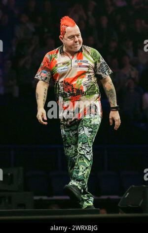 Nottingham, UK. 14th Mar, 2024. Peter Wright dejected during the 2024 BetMGM Premier League Darts, Night 7 at the Motorpoint Arena, Nottingham, England, United Kingdom on 13 March 2024 Credit: Every Second Media/Alamy Live News Stock Photo