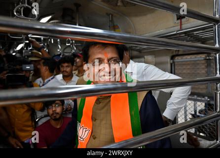 Mumbai, India. 14th Mar, 2024. MUMBAI, INDIA - MARCH 14: Piyush Goyal, Minister of Textiles, Minister of Commerce and Industry and Minister of Consumer Affairs, Food and Public Distribution shares the light moment with co-passenger while traveling between Dadar Railway Station to Borivali Railway Station in 2nd Class compartment, during evening peak hours at Dadar Station, on March 14, 2024 in Mumbai, India. (Photo by Anshuman Poyrekar/Hindustan Times/Sipa USA ) Credit: Sipa USA/Alamy Live News Stock Photo