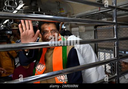 Mumbai, India. 14th Mar, 2024. MUMBAI, INDIA - MARCH 14: Piyush Goyal, Minister of Textiles, Minister of Commerce and Industry and Minister of Consumer Affairs, Food and Public Distribution shares the light moment with co-passenger while traveling between Dadar Railway Station to Borivali Railway Station in 2nd Class compartment, during evening peak hours at Dadar Station, on March 14, 2024 in Mumbai, India. (Photo by Anshuman Poyrekar/Hindustan Times/Sipa USA ) Credit: Sipa USA/Alamy Live News Stock Photo