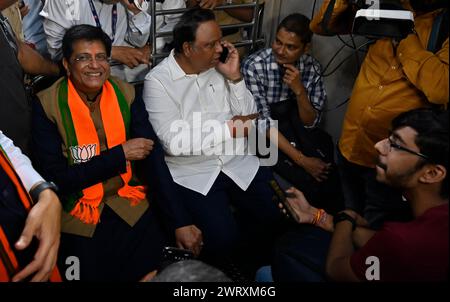 Mumbai, India. 14th Mar, 2024. MUMBAI, INDIA - MARCH 14: Piyush Goyal, Minister of Textiles, Minister of Commerce and Industry and Minister of Consumer Affairs, Food and Public Distribution shares the light moment with co-passenger while traveling between Dadar Railway Station to Borivali Railway Station in 2nd Class compartment, during evening peak hours at Dadar Station, on March 14, 2024 in Mumbai, India. (Photo by Anshuman Poyrekar/Hindustan Times/Sipa USA ) Credit: Sipa USA/Alamy Live News Stock Photo