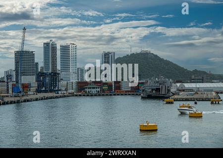 Cartagena, Colombia - July 25, 2023: roll-on roll-off ship docked on cruise terminal pier with tall buildings cityscape and Convento de Santa Cruz de Stock Photo