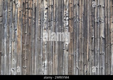 Background weathered wood wall plank board. Greyish barn wall Stock Photo