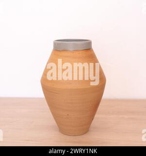 Handmade ceramic vase, white background, red. High quality photo Stock Photo