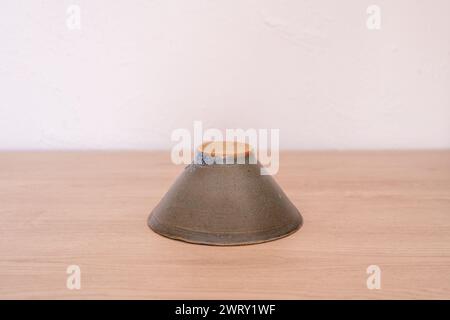 Handmade japanese style ceramic bowl on wood. High quality photo Stock Photo
