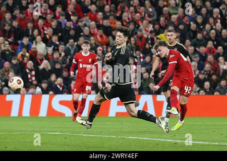Liverpool, UK. 14th Mar, 2024. Bobby Clark of Liverpool (42) has a shot at goal. UEFA Europa League, round of 16, 2nd leg match, Liverpool v Sparta Prague at Anfield in Liverpool on Thursday 14th March 2024. this image may only be used for Editorial purposes. Editorial use only. pic by Chris Stading/Andrew Orchard sports photography/Alamy Live news Credit: Andrew Orchard sports photography/Alamy Live News Stock Photo