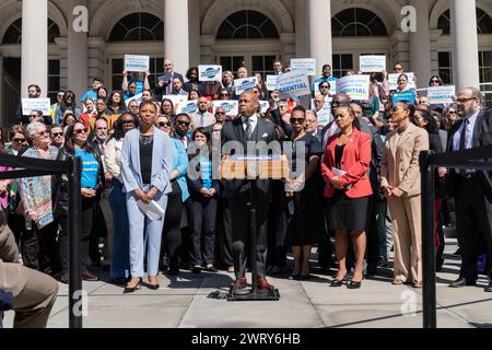 New York, USA. 14th Mar, 2024. Mayor Eric Adams announced $741 million investment for an estimated 80,000 human services workers employed by non-profit organizations with a city contract as part of a new cost-of-living adjustment at City Hall Steps in New York on March 14, 2024. Mayor was joined by City Council Speaker Adrienne Adams. (Photo by Lev Radin/Sipa USA) Credit: Sipa USA/Alamy Live News Stock Photo