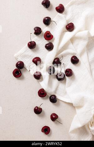 well cooked cherries scattered over the white ceiling Stock Photo