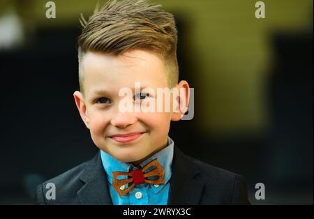 Portrait of schoolboy in suit outdoor. Back to school. September 1, education and learning. Stock Photo